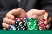 depositphotos_18975855-stock-photo-gambler-going-all-in-pushing.jpg